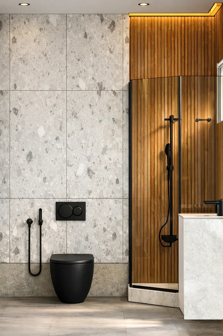 Pent Home bathroom: terrazzo wall beside a fluted timber shower enclosure with black fittings.